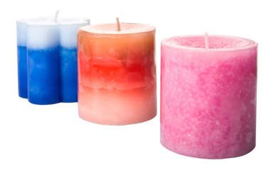 Pink, blue and brown colored aromatic candle 