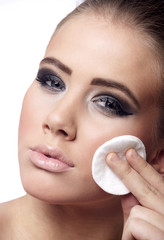 Girl with ponytail, make up removal