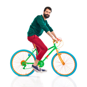 Man on colorful bike