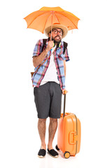 Tourist holding an umbrella