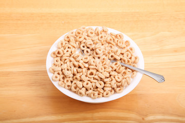 Toasted Oat Cereal in Bowl with Milk