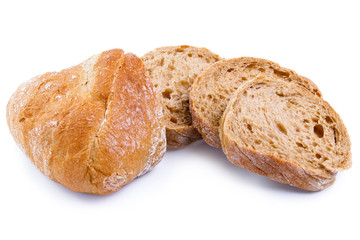 Tasty bread with slices on a white background.