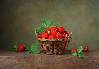 Still life with strawberries in a basket