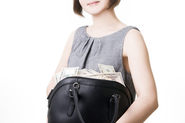 Woman with a bag full of money in the hands of