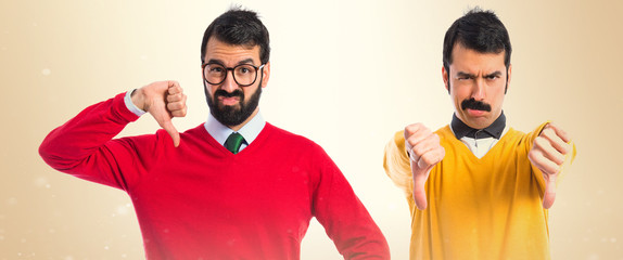 Twin brothers doing bad signal