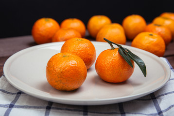 three tangerines