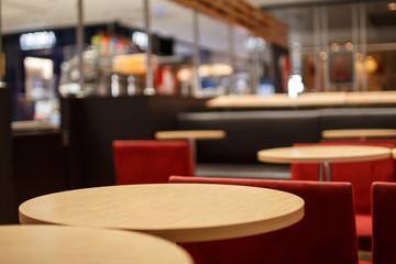 part of a circular table in a coffee bar