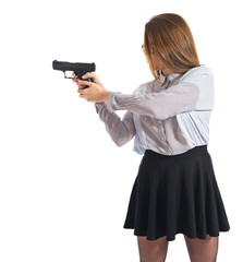 Teen girl shooting with a pistol