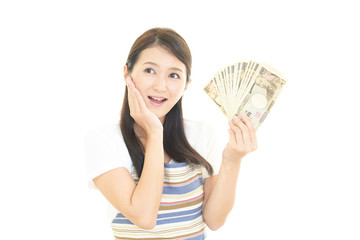 Fototapeta premium 紙幣を持つ女性