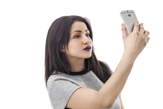 Beautiful woman portrait taking a selfie