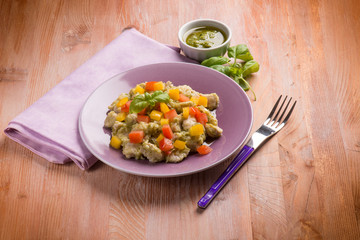 stew chicken with pesto sauce capsicum and tomato