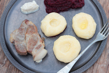 Pork steak with silesian noodles and beetroot puree.