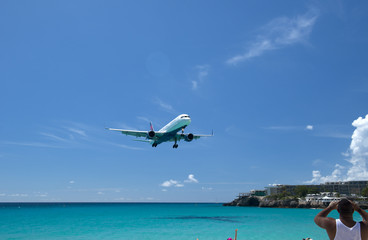 Fototapeta na wymiar Landing at Princess Juliana international airport, Sint Maarten