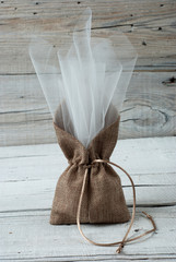 Wedding favor on old wooden table