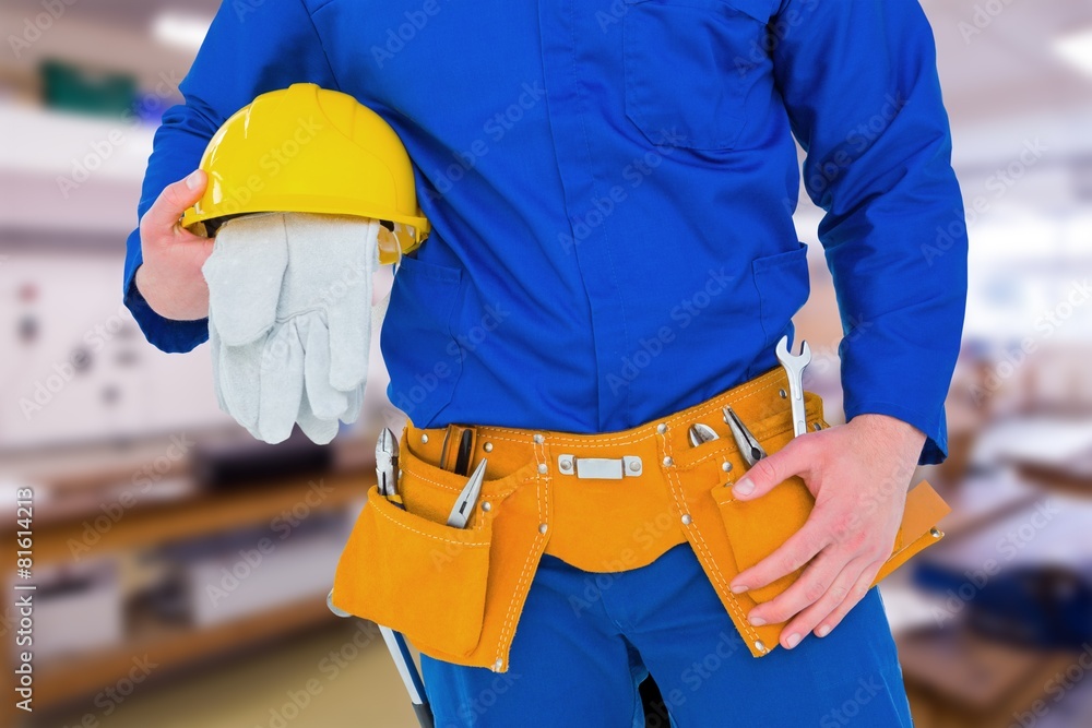 Poster composite image of handyman holding helmet