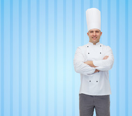 happy male chef cook with crossed hands