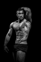 Obraz na płótnie Canvas very muscular handsome athletic man