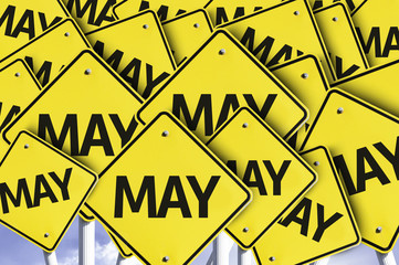 May yellow road sign