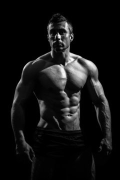 very muscular handsome athletic man © Andriy Petrenko