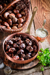 Roasted chestnuts. with garlic sauce