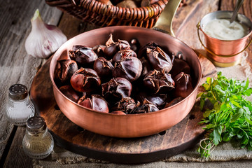 Closeup of roasted chestnuts. with parsley