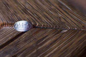 Handmade souvenir coin in Trakai Castle