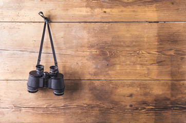Things for hiking hang on a wooden fence