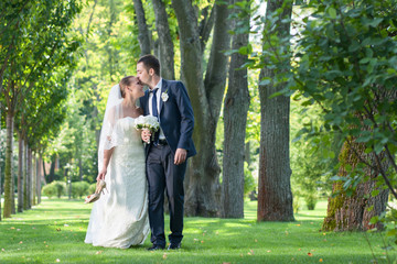 Just married couple walking in the woods