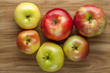 Apples on wooden background