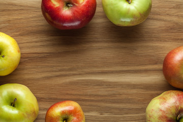Apples on wooden background