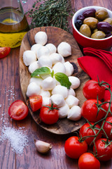 Mozzarella in wooden bowl