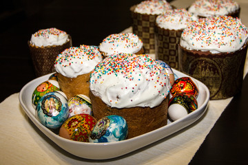 Easter cakes and colored eggs