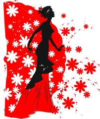 Silhouette of flamenco dancer with a fan