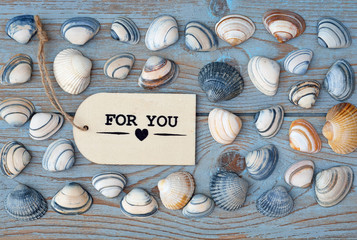 wooden background  with for you label and sea shells - obrazy, fototapety, plakaty