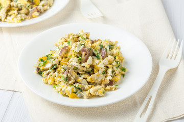 scrambled eggs with red onion and herbs