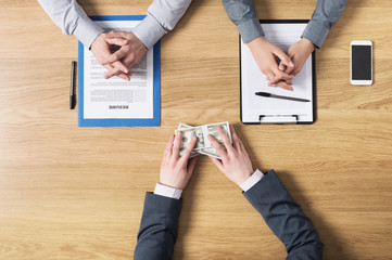 Candidate bribing the employer during a job interview