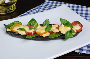 Baked eggplant with tomatoes and cheese