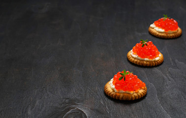 Tartlets with red salmon caviar