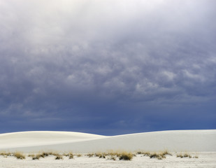 Rolling White Sand Dunes and Dramatic Clouds