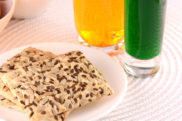 sweet cake on white plate with fresh juice