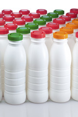 dairy products bottles with bright covers