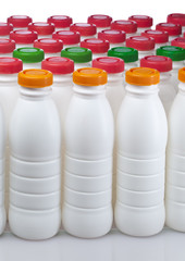 dairy products bottles with bright covers