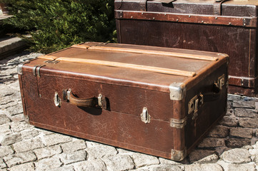 Old closed locked retro vintage leather suitcases