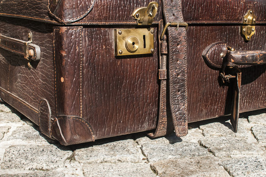Old retro leather suitcase detail closeup