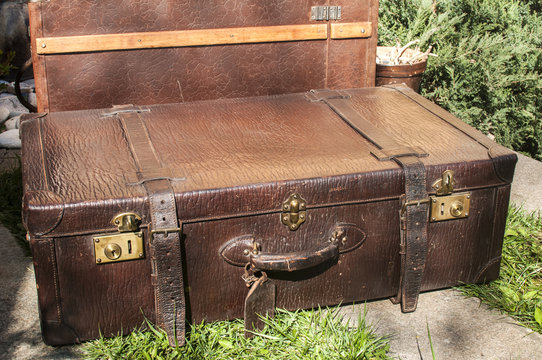 Old closet locked retro vintage leather suitcases