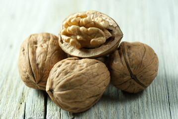 Walnuts on old wooden table
