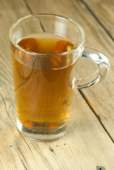 Cup of tea on old wooden table