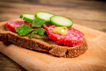 sandwich with sliced sausage