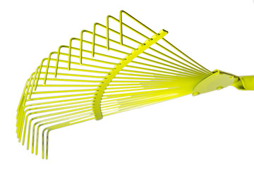 Yellow fan rake isolated white background