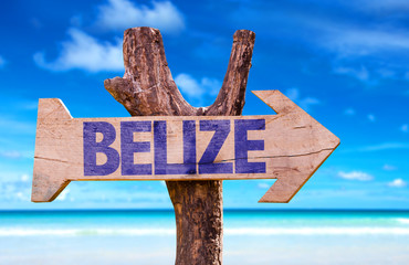 Belize wooden sign with beach background